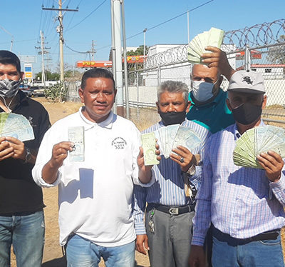 Transportistas responsabilizan a comerciantes por no recibir billetes de 20 mil